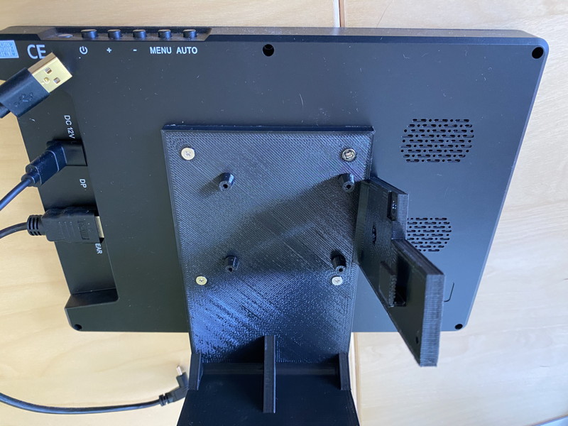 Stand attached to monitor