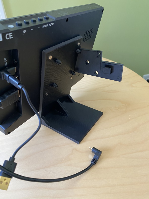 Stand attached to monitor, side view